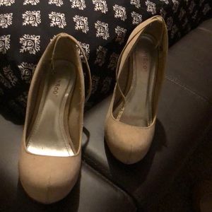 Pair of high heels very soft faux suede.